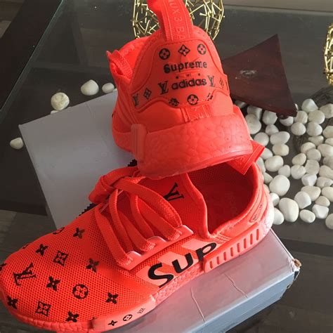 lv supreme nmd red price